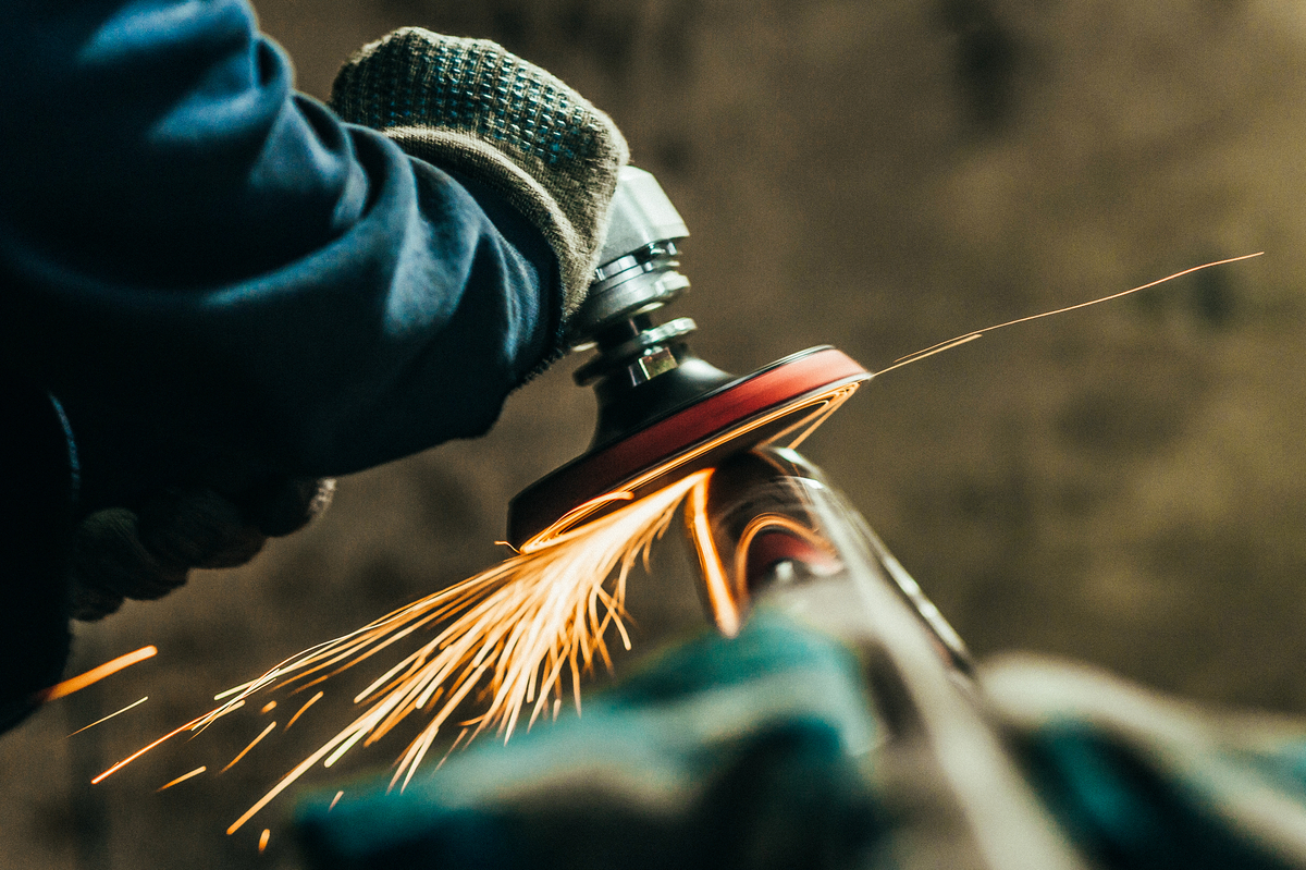 Metal,Polishing,With,A,Hand,Sander,With,A,Polishing,Disk.