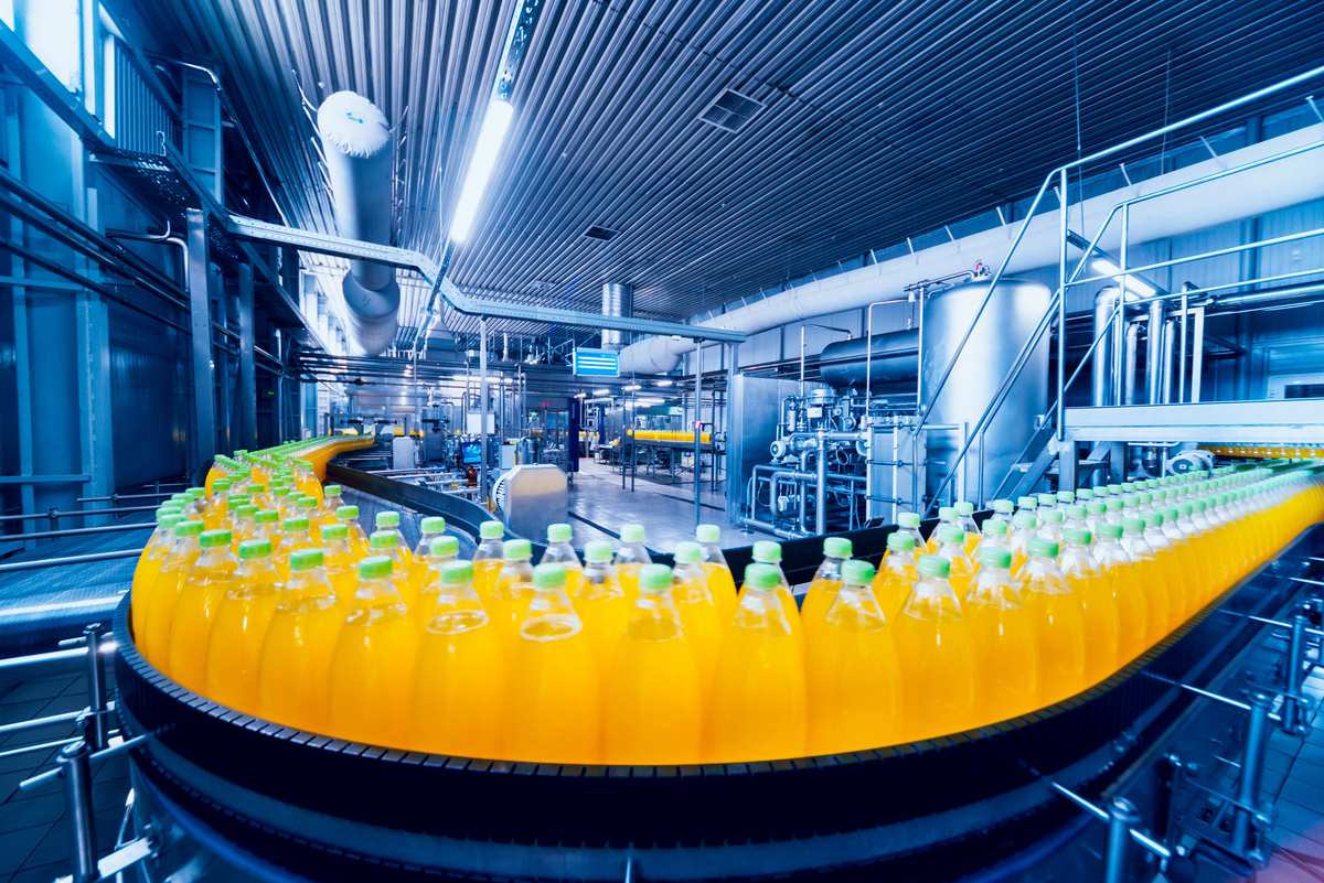 Beverage,Factory,Interior.,Conveyor,With,Bottles,For,Juice,Or,Water.