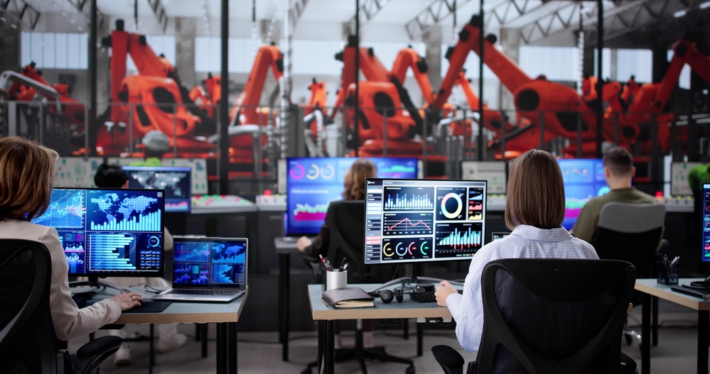 Diverse,Group,Of,Technicians,Monitoring,Scada,System,At,Automotive,Factory.