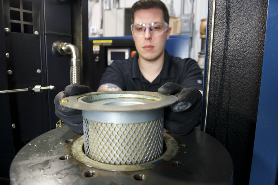 An air-oil separator removes oil mist from the air discharged from an oil-flooded screw compressor by combining the swirling action in the tank with the filtration action of the element. 